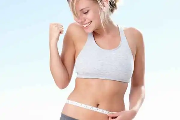 woman happy after fat reduction treatment Greater London (Haringey)