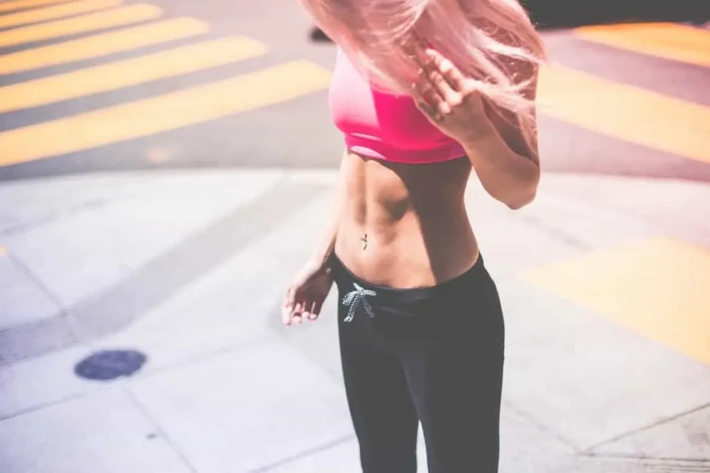 Woman with toned stomach after LA-EMS Body Sculpting Treatment Greater London (Haringey)